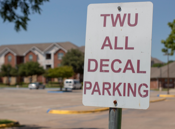 Sign displays words "TWU All Decal Parking"